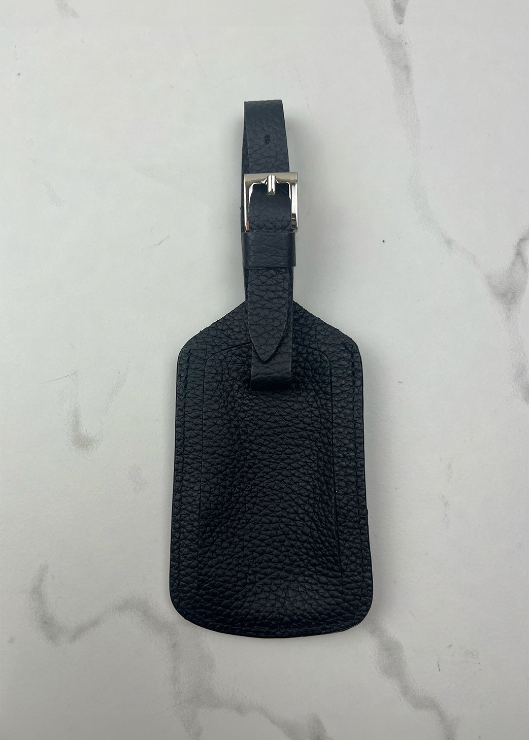 Outlet - Luggage Tag